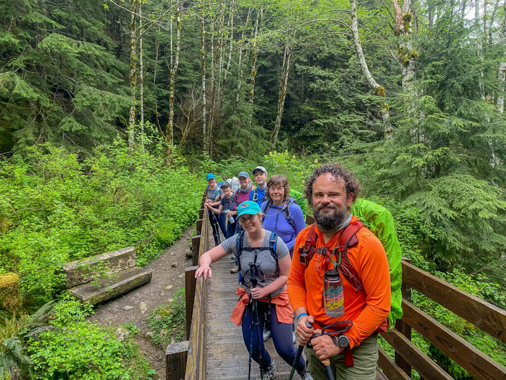 Happy hikers from my CHS-2 group pose on the bridge crossing Granite Creek, on the way to Granite Lakes. My practice: setting a 2.25 mph pace.