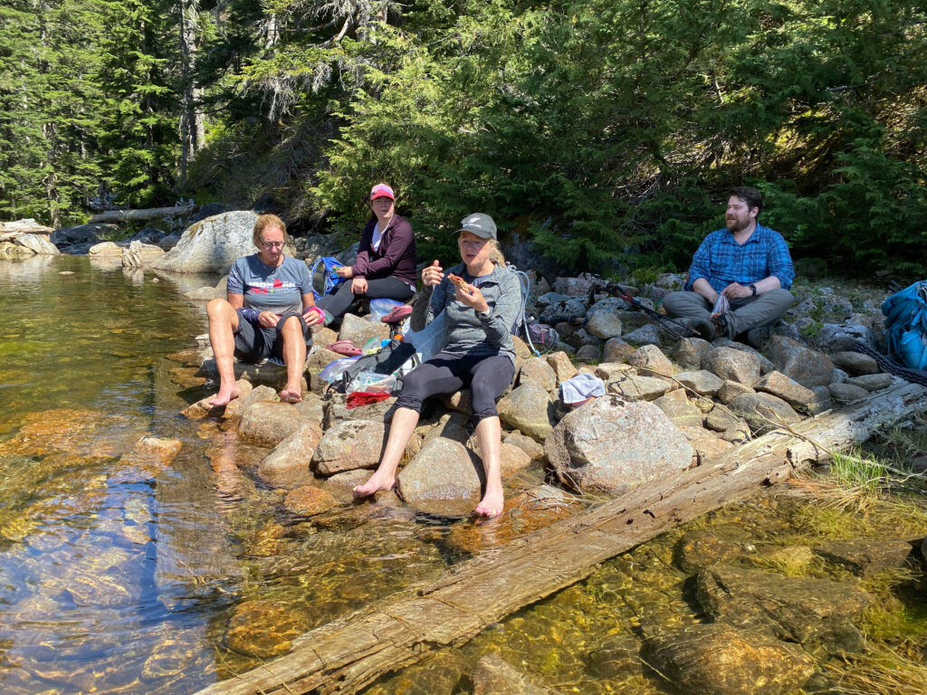 Celebrating our "elite" win with an hour of wading, filtering water, and having snacks at Snoqualmie Lake. Leaving no trace is among one of the most important habits for leaving the outdoors the way you found it or better.