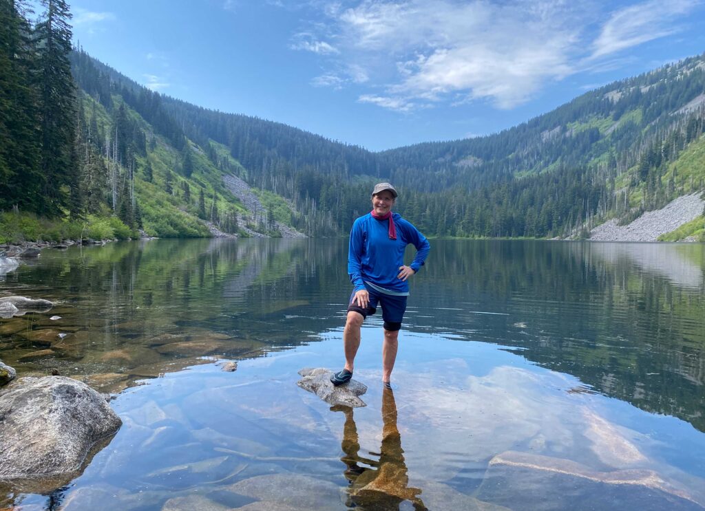 Me, wading in Pratt Lake, just after having a vulnerable moment trying a fantastic gluten-free cookie. Never happier!