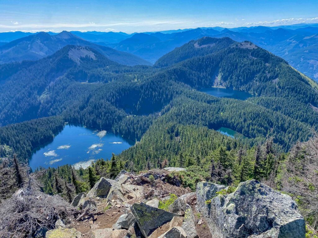 View of the Alpine Lakes area from the summit of Mt. Defiance: Kulla Kulla (left), little Kulla (to its right) and Mason (behind it) where we waded for lunch.