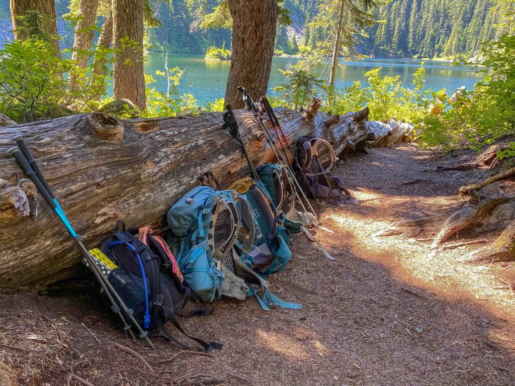 Our packs and poles, waiting for us to be done at Island Lake.
