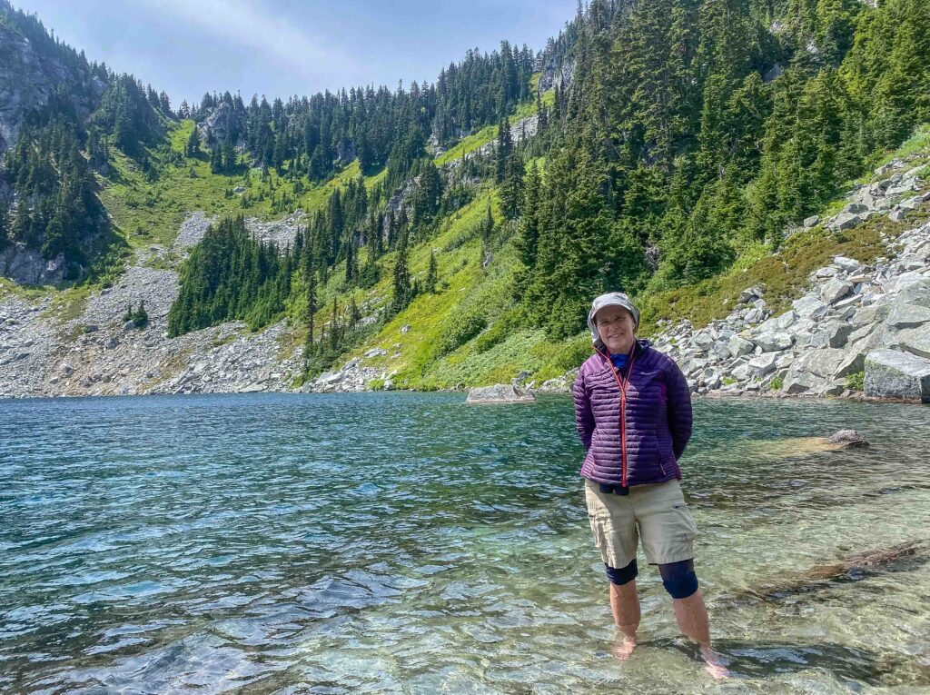 Enjoying wading on a breezy day at Trap Lake on the PCT.