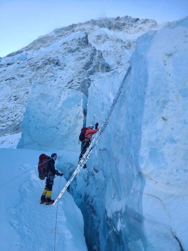 Susan on a Ladder in the Khumbu Ice Fall – courtesy Madison Mountaineering 2025