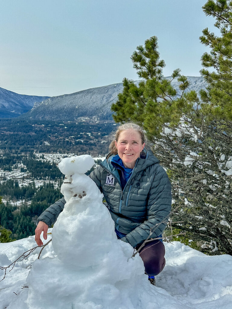 Posing with someone else's snow hiker creation on the summit of Little Si.