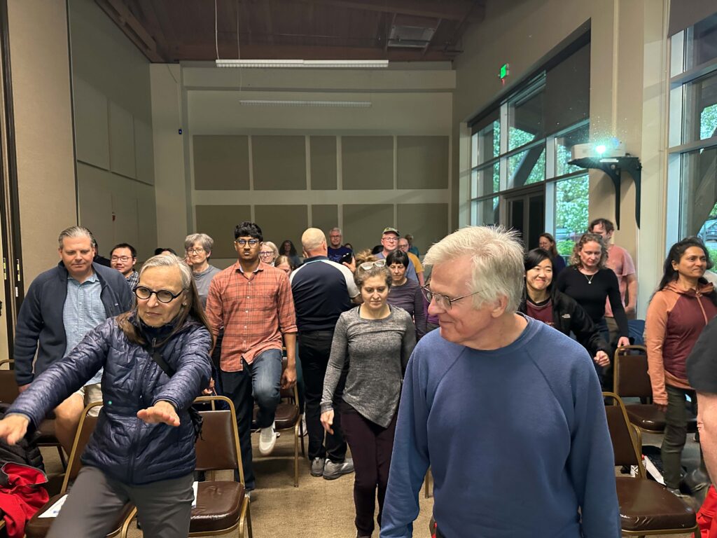 Participants experience a nasal breathing exercise at Magnuson Clubhouse on April 22.