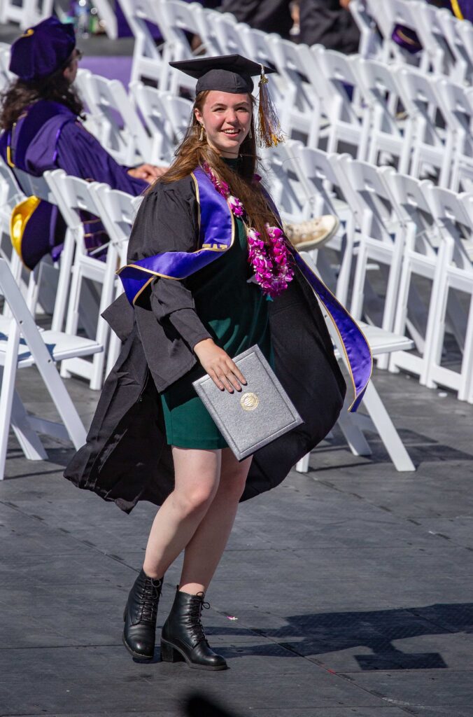 Our daughter completing a happy dance twirl after walking across the stage at Commencement.