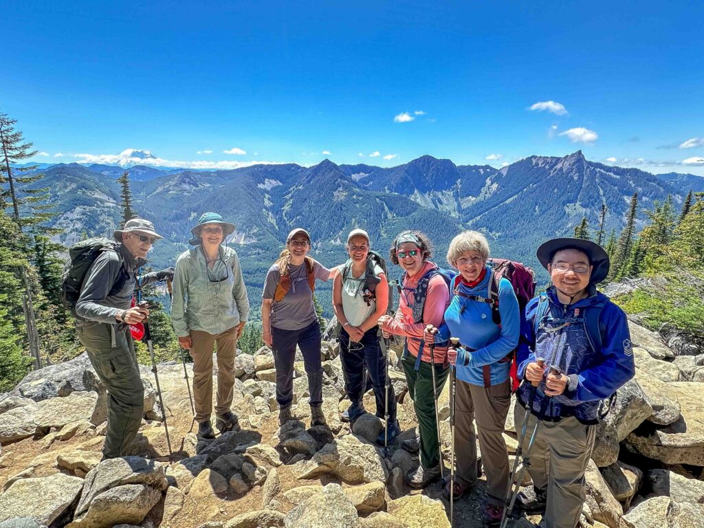 Our CHS-1 crew just after climbing out of Mason Basin July 12, with Rainier in the background.